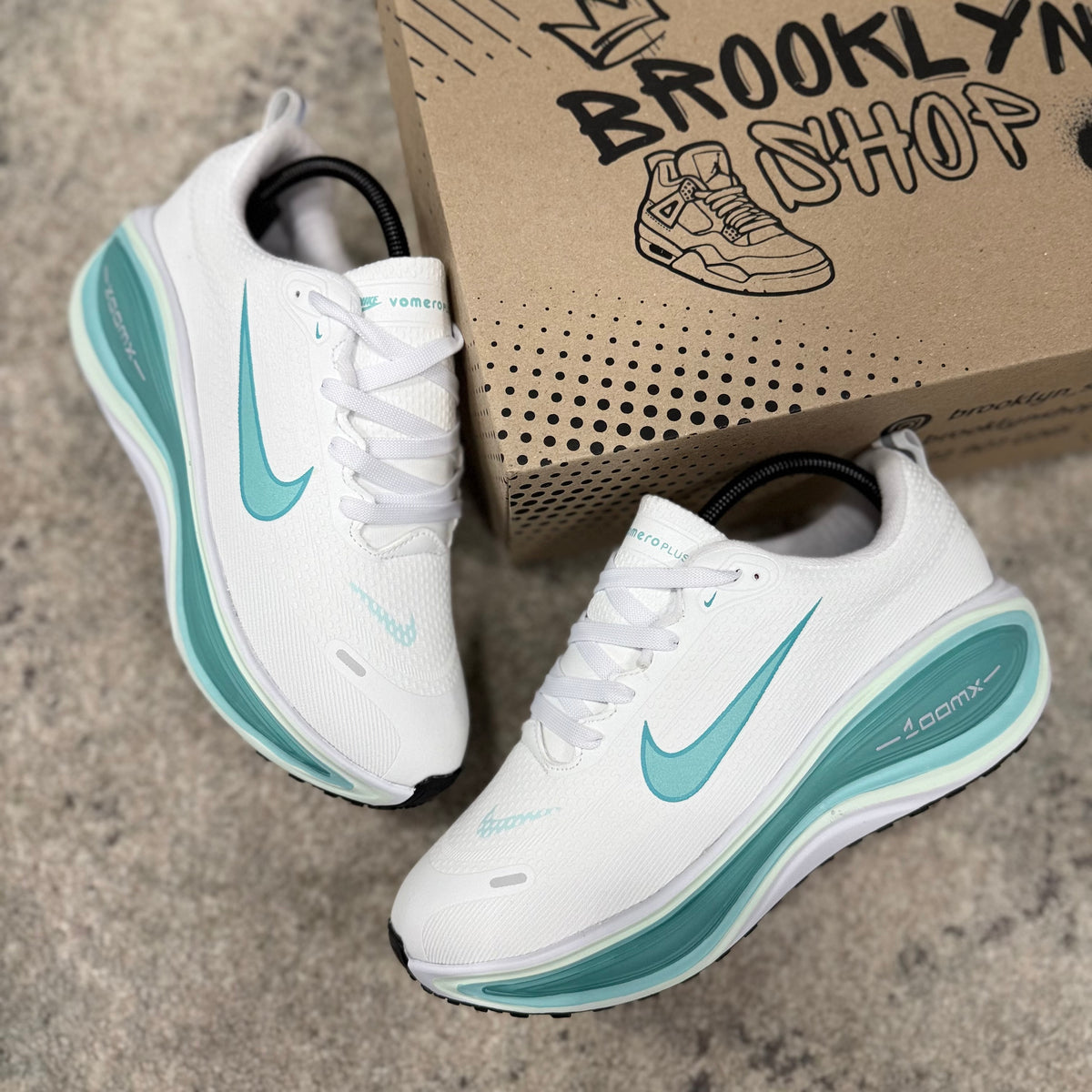 NIKE VOMERO PLUS - DAMA