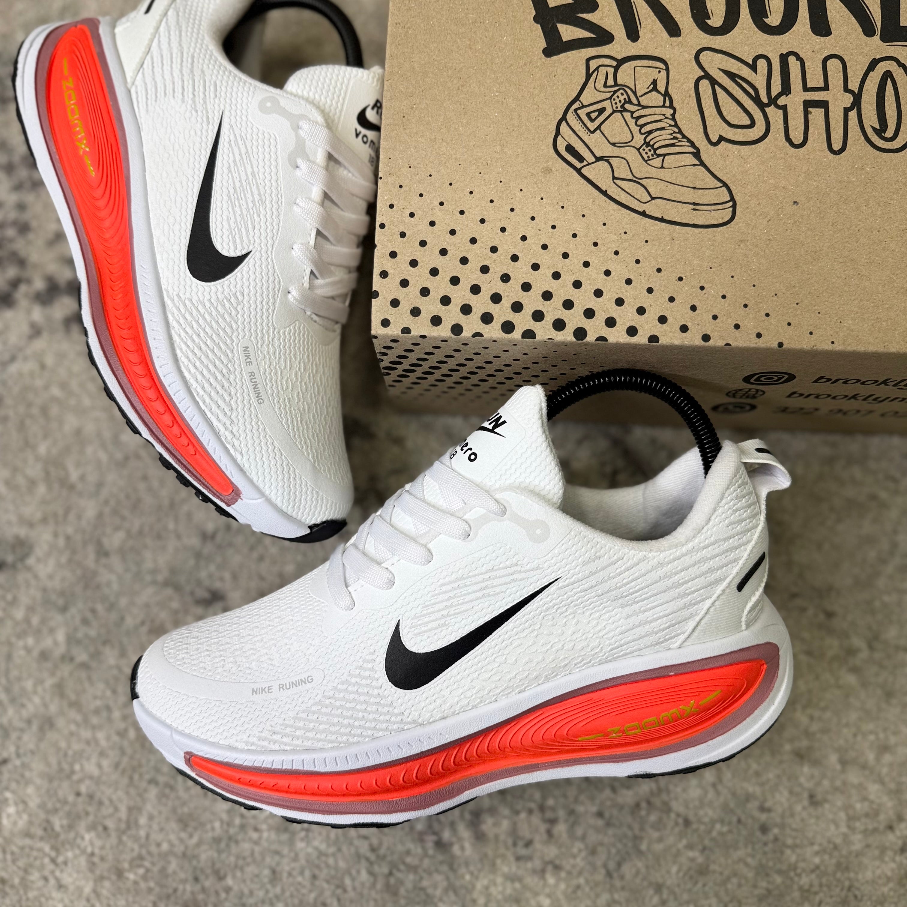 NIKE VOMERO 18 - BLANCO NARANJA
